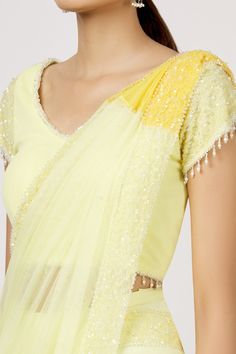 Lemon pre-stitched saree with sequins embroidered border. Paired with tassel blouse.
Component: 2
Embroidered
Neckine: V neck
Sleeve Length: Short
Fabric: Tulle
Color: Yellow
Sequins border - Aza Fashions Tassel Blouse, Stitched Saree, Drape Saree, Embroidered Border, Blouse For Women, Fashion App, Saree With Blouse, Blouse Online, Aza Fashion