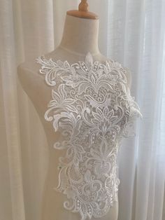 Color: Off White, Black Usage: lace wedding dress applique , bridal headdress,lace collar, lace patch ,Decorative wedding shoes Ideal for Dress, headbware, female underware brim,handbag accessory, hat. pillow,curtain,dolls outfits , home decor etc. My store links： https://www.etsy.com/shop/FionaLace?ref=simple-shop-header-name&listing_id=919538968 Similar product links: https://www.etsy.com/shop/FionaLace?ref=simple-shop-header-name&listing_id=919538968&section_id=32034550 Lace trim White Lace Bodice With Lace Trim, Elegant White Lace Bodice, White Lace Trim Wedding Bodice, White Lace Trim Bodice For Wedding, Party Lace Bodice With Lace Trim, Lace Bodice With Lace Trim For Party, Wedding Bodice With Lace Trim, Elegant White Embroidered Lace Top, Embroidered Fitted Lace Top For Wedding