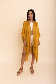 Flaunt your free-spirited style this summer with our Sun-kissed Breeze Frayed Trim Kimono! Perfect for vacations and weekend festivities, the kimono’s lightweight design is bound to keep you cool and comfortable. A layer of frayed trim along the borders adds an extra touch of texture and playfulness that is irresistible. The bright colors are bound to make you stand out so get ready to turn heads! Not only is it perfect for completing any beach-look, but also great to add a little extra flair to Sorority Rush Dresses, Casual Bodysuit, Bachelorette Dress, Golden Rod, Rush Dresses, Free Spirit Style, Bridal Shower Dress, Shower Dresses, Free Spirited