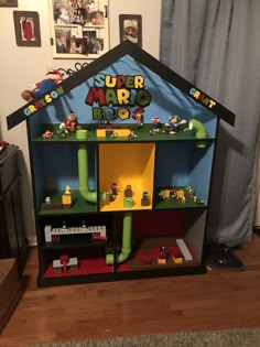 a toy house made to look like a super mario bros game room with toys on the shelves