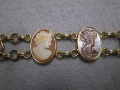 "Such an exquisite cameo bracelet! This one is rather rare, 6 beautiful genuine hand carved cameos are the focal point of this stunning piece. It is vintage 50's/60's Van Dell, new old stock, in excellent vintage condition. Well made in 12kt. gold filled to last for many years to come! It is 7 1/4\" long and 3/4\" wide. A double locking alligator clasp for security. Six different genuine shell cameos interlocking with polished gold, just gorgeous. Of course it is hallmarked Van Dell, and 12kgf." Cameo Bracelet, Silver Emerald Ring, Vintage Cameo, Blowout Sale, Bracelet Vintage, Emerald Ring, Signet Ring, Chain Link Bracelet, Alligator