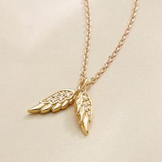 Introducing our exquisite Diamond Angel Wings Pendant Necklace in 14K Solid Gold – a symbol of divine protection and timeless elegance. This guardian angel necklace, adorned with diamonds, serves as a beautiful and meaningful piece of jewelry.Crafted with meticulous attention to detail, the angel wings pendant features sparkling diamonds set in a solid 14K gold setting. The design captures the ethereal beauty of angel wings, symbolizing protection, guidance, and a connection to something greater Jewelry Angel Wings, Angel Wings Pendant, Angel Wings Necklace, Diamond Angel, Ethereal Jewelry, Guardian Angel Necklace, Angel Wings Jewelry, Gold Pendent, Wings Pendant