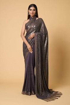 Charcoal saree with metallic sequin embroidery. Comes with sequined unstitched blouse piece. - Aza Fashions Glamorous Embellished Pre-draped Saree For Celebrations, Semi-stitched Sequined Pre-draped Saree For Reception, Embellished Georgette Pre-draped Saree For Celebration, Sequin Pre-draped Chinon Saree, Glamorous Georgette Pre-draped Saree For Celebration, Sequin Chinon Pre-draped Saree For Diwali, Festive Silk Pre-draped Saree With Sequins, Festive Sequined Pre-draped Georgette Saree, Designer Pre-draped Sequin Saree For Diwali