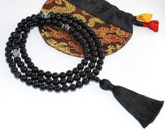 Black Wooden Beads For Meditation, Traditional Hand-strung Black Mala, Black Spiritual Beads For Meditation, Traditional Black Hand-strung Mala, Traditional Black Mala With 8mm Beads, Traditional Black Mala With 108 Beads, Black Spiritual Healing Beads, Hand-strung Black Mala With Round Beads, Black 108 Beads Mala For Meditation