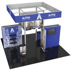 an exhibit stand with blue and white signage on it's sides, including the logo for alpha