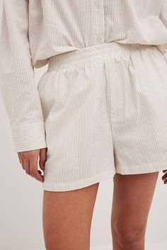 These shorts feature a textured material. They have an elasticized high waist with open side pockets. Inseam length in size 36: 7 cm / 2.75 in. Seersucker Shorts, Elastic Waist Shorts, Future Fashion, Na Kd, Women Empowerment, Elastic Waist, High Waist, High Waisted, Elastic