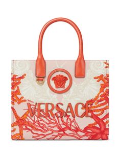 orange/beige cotton canvas leather trim all-over graphic print gold-tone hardware Medusa Head motif logo patch to the front two rolled top handles strap and press-stud fastening main compartment internal logo stamp internal zip-fastening pocket This piece comes complete with a protective dust bag. Versace Under The Sea, Versace Tote Bag, Versace Sea Collection, Versace Travel Bag, Versace La Medusa Bag, Versace Pink, Versace Gold, Versace Handbags, Small Tote Bag