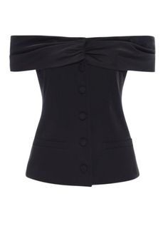 Introducing our Black Nadine Suit top. The off shoulder design and suiting details make it a perfect statement piece. Crafted from soft, premium fabrics, it's a timeless wardrobe staple that will instantly upgrade any outfit. Wear this to grab drinks with friends or to your next dinner party. PRODUCT DETAILS + CARE 100% Polyester Dry Clean Only SIZE + FIT XS: Bust 33" Length 16" S: Bust 34" Length 16" M: Bust 35" Length 17" L: Bust 38" Length 18" Runs true to size Keilah is 5'9 & wears an XS Classic Tailored Top For Party, Formal Fitted Off-shoulder Top For Summer, Chic Fitted Off-shoulder Top, Chic Fitted Off-shoulder Top For Party, Chic Fitted Off-shoulder Party Top, Elegant Fitted Off-shoulder Top For Date Night, Chic Fitted Off-shoulder Top For Formal Occasions, Elegant Off-shoulder Blouse For Formal Occasions, Elegant Fitted Off-shoulder Top