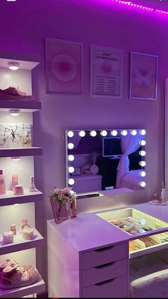 there is a vanity with lights on it in the room