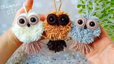 three little owls are hanging from a tree ornament with tassels on it