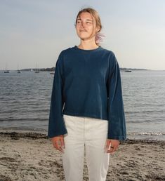 A Foundational Wardrobe Piece-Taking cues from Intention Tee, a favorite from seasons past, the Intent Tee is the long-sleeved sister silhouette. Crafted from dense knit cotton & dyed with plants, the easeful top is mindfully cut to have a loose, slightly oversized fit equally suited for lounging & layering. The shapely tee is characterized by a classic crew neckline with exposed stitching to create an illusionary V-dip along the neck, a subtle detail adding a touch of enchantment to the everyda Fall Cotton Sweatshirt In Washed Blue, Fall Washed Blue Cotton Sweatshirt, Blue Organic Cotton Long Sleeve Tops, Oversized Hand-dyed Cotton Sweatshirt, Hand Dyed Cotton Sweatshirt With Relaxed Fit, Fall Cotton Top In Washed Blue, Casual Long Sleeve Tops With Natural Dye, Relaxed Fit Long Sleeve Top With Natural Dye, Organic Cotton Long Sleeve Tops For Fall