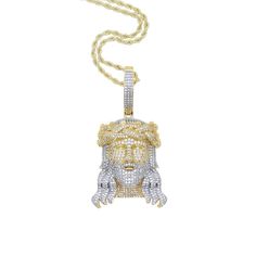 The Full Pave Multicolor Jesus Piece is flooded with gemstones that shine from every angle. This pendant is a statement piece that exudes opulence and detailed craftsmanship. Includes a 2mm Rope Chain. Charm Size: 38mm x 72mm PVD Plating guarantees a long-lasting finish.