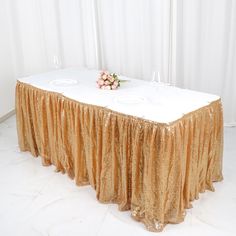 the table is covered with gold sequins