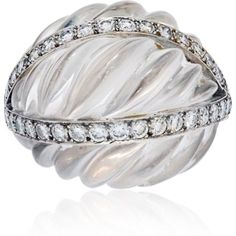 This exquisite piece of jewelry, the David Webb Platinum & 18K White Gold Rock Crystal Diamond Arch Ring, is a true testament to the brand's exceptional craftsmanship and timeless design. Created in the 1970s, this ring showcases a captivating fluted rock crystal, exuding an air of elegance and sophistication.What sets this ring apart are the two rows of dazzling round diamonds, meticulously set in platinum and 18 karat white gold, totaling approximately 1.20 carats. These sparkling diamonds add Luxury Dome Ring With 17 Jewels For Anniversary, Designer Oval White Gold Ring, Luxury Vvs Clarity White Gold Dome Ring, White Gold Dome Ring With Diamond, White Gold Dome Ring With Polished Diamond, Designer Diamond Rings With Polished Finish, Designer Diamond Cut Rings, Designer Diamond Cut Round Rings, Designer Round Diamond Cut Rings