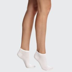 Wolford knit slip socks. Low-rise ankle for no-show. Cotton/polyester/spandex. Imported. Comfortable White No-show Socks, Comfortable No-show Socks, Comfortable Stretch White Socks, White No-show Casual Socks, Casual White No-show Socks, White Stretch Casual Hosiery, Casual White Stretch Hosiery, Sporty Stretch Lightweight Socks, Sporty Fitted No-show Socks