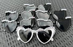 These personalised Sunglasses are the perfect accessory to give any bride-to-be or bridal party that WOW factor.  The black/whiteheart shaped sunglasses come personalised with your bride-to-be's future name e.g Future Mrs Smith or the hen's name e.g Emmas Hen or Bride Tribe.  Please specify at check-out what wording you would like on the sunglasses. Max 4 words.  Please message if you have any queries. Personalised Sunglasses, Bridal Party Sunglasses, Bride Sunglasses, Birthday Sunglasses, Personalized Sunglasses, Mrs Smith, Party Sunglasses, Shaped Sunglasses, Personalized Bride