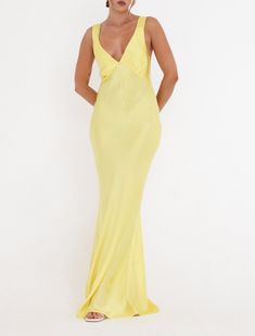 Inspo: Andie Anderson. Elegant and refined, this slip dress gently skims your frame before falling to a floor-length hem. Fitted Feminine Yellow Maxi Dress, Retro Yellow Maxi Dress, Fitted Floor-length Orange Maxi Dress, Orange Floor-length Beach Dress, Andie Anderson, Orange V-neck Summer Maxi Dress, Sunset Strip, Knit Outerwear, Yellow Outfit