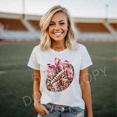 Disco Football Women's Shirt Attention all football fans! The perfect shirt for game day has arrived! Whether you prefer short sleeves or crewneck sweatshirts, these fun graphic shirts have got you covered for the upcoming fall football season! Sporty T-shirt For Game Day During Football Season, School Spirit T-shirt For Cheerleading In Fall, Cheerleading Fan Apparel Tops For Football Season, Crew Neck Tops For Football Season Game Day, School Spirit Crew Neck Top For Football Season, Football Season School Spirit Crew Neck Top, Crew Neck Top For Football Season School Spirit, Game Day Tops With Football Season Graphic Print, Game Day Sports Fan Tops For Football Season