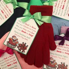 several christmas gift tags and gloves on display