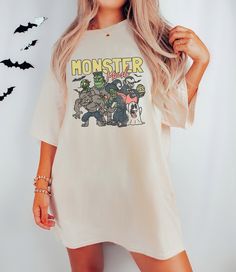 Monster Mash Unisex Tshirt for Halloween. Comfort Colors introduces its garment-dyed t-shirt; a fully customizable tee made 100% with ring-spun cotton. The soft-washed, garment-dyed fabric brings extra coziness to your wardrobe while the relaxed fit makes it an excellent daily choice. The double-needle stitching throughout the tee makes it highly durable while the lack of side-seams helps the shirt retain its tubular shape. .: 100% ring-spun cotton .: Medium fabric (6.1 oz/yd² (206.8 g/m .: Relaxed fit .: Sewn-in twill label Horror Themed Cotton T-shirt With Character Print, Halloween Graphic Print Relaxed Fit T-shirt, Halloween Fan Merchandise T-shirt With Sublimation Print, Halloween Band Merch T-shirt Relaxed Fit, Halloween Cotton T-shirt With Letter Print, Spooky Relaxed Fit Screen Print T-shirt, Spooky Screen Print Relaxed Fit T-shirt, Halloween Letter Print Cotton T-shirt, Halloween Relaxed Fit Graphic T-shirt