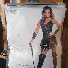 a cardboard box with a woman dressed in costume