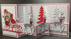 three christmas cards with reindeers and sleigh on them, one is made out of paper