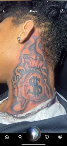 a man with a tattoo on his neck