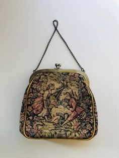 Vintage Handbag JR Julius Resnick Tapestry Midcentury Evening Bag Enchanting Courting Scene I Ship Globally One of my favorites from a group of antique handbags I recently acquired.   The courting scene on this tapestry bag is just so enchanting.  Other things I love about this bag are the gold piping and the overall condition of this bag.  This bag is quite solid and could be used for an evening out, if handled with care, of course!  Unfortunately, it did not pass my cell phone test, but my iph Vintage Tapestry Shoulder Bag For Travel, Vintage Tapestry Handmade Bags, Antique Tapestry Evening Bag, Vintage Handmade Tapestry Bag, Vintage Tapestry Travel Bag, Vintage Tapestry Pouch Bag, Victorian Style Embroidered Rectangular Bag, Embroidered Tapestry Rectangular Shoulder Bag, Vintage Embroidered Tapestry Shoulder Bag