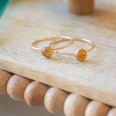 Radiate warmth and positivity with our stunning citrine ring. Crafted to capture the golden hues of the sun, this ring showcases the vibrant beauty of citrine gemstones. Perfect for adding a touch of brightness to your ensemble, or as a symbol of joy and abundance in your life. Don't know your ring size? Ring Size Guide or Buy Ring Sizer …………………………………. Details: Stone Citrine measuring 5mm Available in 14k Gold Filled or Sterling Silver Waterproof and can be worn everyday Size Inclusive and made Gold Gemstone Ring, Citrine Ring, Argentium Silver, Citrine Gemstone, Ring Sizer, Ring Size Guide, Birthstone Ring, Gemstone Ring, Sterling Ring