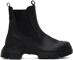 Ankle-high recycled rubber boots in black. · Pull-loops at collar · Logo printed at heel collar · Elasticized gusset at sides · Jersey lining · Textured rubber midsole · Treaded rubber outsole Supplier color: Black Ganni Boots, City Boots, Black City, Cool Girl Style, Slouched Boots, Black Chelsea Boots, Boot Brands, Recycled Rubber, Rubber Boots