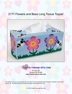 a tissue box with flowers and bees on it