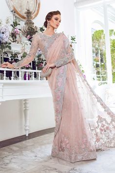 Royal Pink Embellished Pakistani Wedding Dress in Net Saree Style is a beautiful attire in Premium quality fabric. This Pakistani Dress is available Online Pink Pakistani Wedding Dress, Heavy Saree, Sarees For Girls, Pakistani Dresses Online, Saree Style, Designing Ideas, Pakistani Wedding Dress, Party Wear Saree, Net Saree