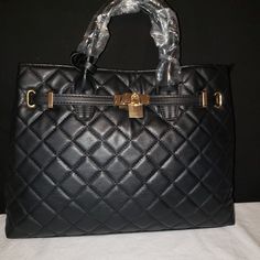 Badgley Mischka Big Quilted With Lock Double Handled Black Bag, This Bag Has Black Linen On The Inside, Zippered Pocket And Two Pouches. Measurements Are 14" X 10 3/4" X 9 3/4" Deep. This Bag Is Made Of Vegan Leather And Perfect For Everyday Use. Very Roomy On The Inside. Chic Quilted Double Handle Satchel, Quilted Leather Shoulder Bag With Double Handle, Black Quilted Double Flap Bag, Black Quilted Shoulder Bag With Double Handle, Black Diamond-quilted Evening Bag, Black Bag, Black Linen, Badgley Mischka, Zipper Pocket