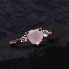 Opal Engagement Diamond Ring Heart Shape Opal Wedding Ring 14k Rose Gold Unique Ring Bridal Anniversary Gift October Birthstone Gift For Her Brand - LATELIERDBIJOUX Type Of Stone - Opal Stones Color - Fire opal Cut of Stones - Heart Birthstone - October Second Stone - CZ Diamond Second Stone Shape - Round Second Stone color - Colorless Check out my other items! PAYMENTS We accept PayPal, If we do not receive payments immediately we will hold the item only for one working day for your payments an Rose Gold Jewelry For Valentine's Day Proposal, Rose Gold Birthstone Heart Ring For Promise, Rose Gold Birthstone Heart Promise Ring, Dainty Rose Gold Heart Ring For Wedding, Rose Gold Dainty Heart Ring For Wedding, Rose Gold Promise Jewelry For Valentine's Day, Heart Cut Dainty Birthstone Ring For Wedding, Dainty Heart-shaped Birthstone Ring For Wedding, Dainty Heart Cut Birthstone Ring For Wedding