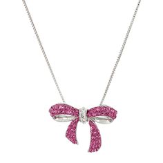 Gift this cute bow pendant to the fashionista in your life! Round-cut pink crystals decorate this petite bow's ribbons, while round-cut white crystals tie the piece together in the center, crafted in sterling silver. Piece measures 3/4 by 1 inches. Comes with a sterling silver 18-inch box chain with a spring ring clasp. The piece comes with a ".925" sterling silver stamp as a symbol of guaranteed product quality. Adorable Bow Design Pink & White Crystals Sterling Silver Measures 3/4 by 1 Inches Bow Pendant, Swarovski Crystal Jewelry, Pink Swarovski, Silver Chain Style, Bow Jewelry, Women's Jewelry Sets, White Crystals, Bow Design, Fine Jewellery Necklace