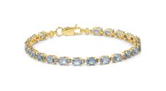 This elegant aquamarine and solid gold bracelet is a simple, yet unique piece that is the perfect addition for everyone's fine jewelry collection. Each aquamarine stone is carefully placed on the solid gold setting to create the perfect everlasting shine.  The price and stone count vary depending on the length you choose. All of our products are made with 10k/14k Solid Gold and are stamped with Gold Purity for Certification.  We want to make sure that each purchase is to your desire! We can customize any ring and gemstone to be exactly to your liking. We offer complimentary engraving, gift wrapping, and  30 day free returns/exchanges with every purchase! If you have any questions, comments, or concerns please send us a message and we will be more than happy to meet all of your needs!  We l Aquamarine And Gold Bracelet, Aquamarine Bracelet Jewelry As A Gift, Aquamarine Bracelet Jewelry Gift, Elegant Aquamarine Bracelet Jewelry, Yellow Gold Aquamarine Gemstone Jewelry, Aquamarine Gemstone Jewelry In Yellow Gold, Modern Yellow Gold Jewelry With Blue Topaz, Modern Yellow Gold Blue Topaz Jewelry, Aquamarine Gemstone Bracelet