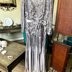 This Is A Beautiful Dress With Overlay Chiffon And Silver Sequins, Accentuate The Waist With A Satin Tie Sash. Very Elegant And Worn Only For 2 Hours. Dress With Overlay, Dresses Beautiful, Grey Maxi Dress, Silver Sequin, Beautiful Dress, Beautiful Dresses, Chiffon, Size 10, Maxi Dress