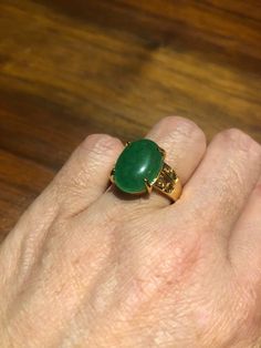 Vintage Lucky Green Nephrite Jade Golden ring Large green nephrite jade Gold finished German Silver Vintage ring, does not tarnish, NOT sterling Size 7, 8, 8.5, or 9 All rings are shipped free in the US in a nice gift box. Check out our over a THOUSAND great reviews Engraving is $4 per letter and is not always perfect depending on the piece. It can take a few days if the jeweler is busy. This is payable to Paypal Judithsltd@gmail.com Green Emerald Oval Cabochon Ring, Green Emerald Ring With Oval Cabochon, Green Cabochon Emerald Ring For Anniversary, Jade Gemstone Rings For Healing, Green Emerald Cabochon Ring For Anniversary, Green Oval Gemstone Rings, Spiritual Jade Rings As Gift, Hallmarked Green Emerald Gemstones, Green Cabochon Emerald Ring For May Birthstone