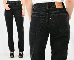 "These high rise denim Levi's are available in a black wash with a tapered leg. Button/zipper fly closure. Wash will vary some as each pair is pre-owned vintage Sized by us in accordance with modern day size charts. Available in 00-22 in regular, short, or long inseams. Style Name: Levi's style number will vary as you may receive a 550, 951, 521, 512, etc. Mid-weight cotton denim Closure: button/zipper fly Leg Opening: tapered/slim IF YOUR NATURAL WAIST MEASURES...THEN ORDER A SIZE... 24\"-24.5\ Mid-rise Black Jeans With Button Zip Fly, Black Mid-rise Jeans With Button Zip Fly, Black High Rise Jeans With Button Zip Fly, Vintage Black Jeans For Spring, Vintage Black High Rise Jeans, Vintage Black Jeans With Belt Loops, Zara Photography, High Waist Black Jeans, Black Levi Jeans