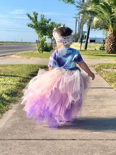 This high low tutu is next level. Over 100 yards of tulle, short in the front, long in the back with tiered layers creating a wild look. Sizing Info: 1-3T is roughly 6 inches long in the front 3-5T is roughly 8 inches long in the front Add your color choices in the notes at check out. Playful Ruffled Tutu Dress, Playful Ruffled Tutu Dress In Tulle, Playful Ruffled Tulle Tutu Dress, Whimsical Summer Tutu Dress With Tulle Skirt, Whimsical Tulle Skirt Tutu Dress For Dress-up, Summer Tiered Tutu Dress With Tulle Skirt, Summer Purple Tulle Tutu Dress, Whimsical Summer Tutu Dress For Cake Smash, Spring Purple Tutu Dress With Tulle Skirt