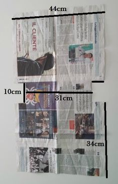 three pieces of newspaper taped to the wall, each with different images and sizes on it