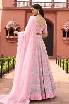 Pink attached cancan lehenga with detailed pink and ice blue floral embroidery and pleated border. Comes with coordinating blouse and scalloped border dupatta. - Aza Fashions Pink Chikankari Embroidered Wedding Gown, Pink Chikankari Embroidery Wedding Gown, Pink Georgette Choli With Sheer Dupatta, Pink Georgette Gown With Chikankari Embroidery, Pink Semi-stitched Georgette Lehenga, Designer Pink Gown With Chikankari Embroidery, Festive Pink Gown With Chikankari Embroidery, Pink Semi-stitched Lehenga With Cutdana, Semi-stitched Pink Lehenga With Cutdana