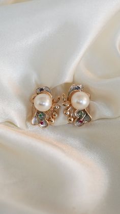 * Earring Material: Pearl, Emerald, Ruby, Sapphire, 14K Yellow Gold * Earring Dimensions: 0.75x0.5 Inch * Stone Weight & sizes: Pearl - 8-8.1MM, Emerald - 0.02ct, Sapphire -0.03ct, Ruby-0.03ct * Overall weight: 7.6g * Earring material: 14k yellow gold, Omega Post Lever Back Multi-stone White Gold Earrings For Formal Occasions, Evening Multi-stone Round Earrings, Elegant Multi-stone Diamond Earrings For Formal Occasions, Luxury Multi-stone Earrings For Anniversary, Formal Multi-stone Fine Jewelry Earrings, Exquisite Multi-stone Yellow Gold Earrings, Exquisite Yellow Gold Multi-stone Earrings, Formal Yellow Gold Multi-stone Earrings, Elegant Multi-stone Round Earrings