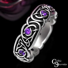 See more options for this design: www.etsy.com/shop/CelticEternity?search_query=1916 Band Height: 6.4mm Stones: 8x2mm Amethyst This ring features intricate Celtic knotwork blended with trinity knots. Trinity knots are made of a continuous line interweaving around itself into 3 points which can symbolize soul, heart, and mind; past, present, future; father, mother, children. This Celtic symbol can be used to signify the unity of your family and endless love. Every ring is handmade to order and in YOUR CUSTOM size; we do not keep backstock. Please buy our refundable ring sizer (BEFORE ORDERING) as most rings cannot be resized because of the continuous knotwork: www.etsy.com/listing/937178260 About This Item: Cast in solid 925 sterling silver (nickel-free), these rings are made of 100% recycl Wedding Ring Womens, Amethyst Wedding Ring, Trinity Knot Ring, Amethyst Wedding Rings, Celtic Symbol, Amethyst Wedding, Celtic Ring, Celtic Wedding Rings, Celtic Knotwork