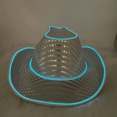 LED light up products online are trending all around the world and if you wish to get your hands on the most high quality and aesthetically appealing accessories then you have come to the right place. The unisex LED EL wire sequined white cowgirl hat or cowboy hat with lights can be worn by men as well as women to various occasions time and again. There are so many designs which you can choose from in order to make a unique purchase. LED flashing light up white EL wire sequin cowboy hat in white Sequin Cowboy Hat, White Cowgirl Hat, El Wire, Cowboy Party, Cowgirl Hat, Cowgirl Hats, Cowboy And Cowgirl, Cowboy Hat, How To Look Classy