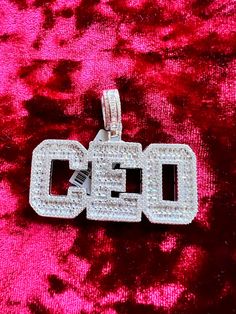 "925 sterling silver, AAA CZ, iced out, all bling, CEO pendant. Comes with 20\" steel rope chain. Length of the pendant is 2\" and height is approximately 1.5\" including bail. Every effort is made to show the item as it appears to the eye but items may be bigger or smaller depending on the way they were photographed.Please read the measurements under each listing and message me for any questions.Thanks" Silver Cuban Link Iced Jewelry, Iced Out Cubic Zirconia Jewelry For Streetwear, Streetwear Iced Out Jewelry With Cubic Zirconia, Streetwear Iced Out Cubic Zirconia Jewelry, White Bling Jewelry For Streetwear, Luxury Silver Jewelry For Streetwear, Customized Silver Cuban Link Jewelry, Iced Silver Cubic Zirconia Necklaces, Silver Iced Out Pendant Necklace