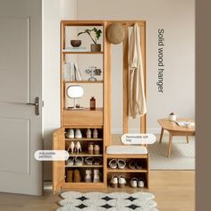 a wooden cabinet with shoes and other items on it next to a rug in the living room