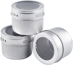 three metal containers with lids on white background