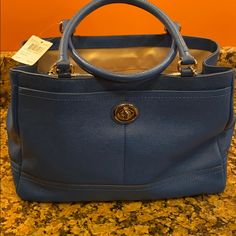 This Is A Fabulous Shade Of Blue Leather! Light Blue Top Handle Bags For Office, Light Blue Tote Bag For Office, Light Blue Office Tote Bag, Blue Tote Bag With Top Carry Handle, Blue Shopping Bag With Top Carry Handle, Luxury Blue Bag For Everyday Use, Blue Top Handle Bag For Office, Light Blue Top Handle Bag, Blue Shopping Bag With Detachable Handle