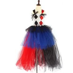 a dress on a mannequin with red, white, and blue tulle